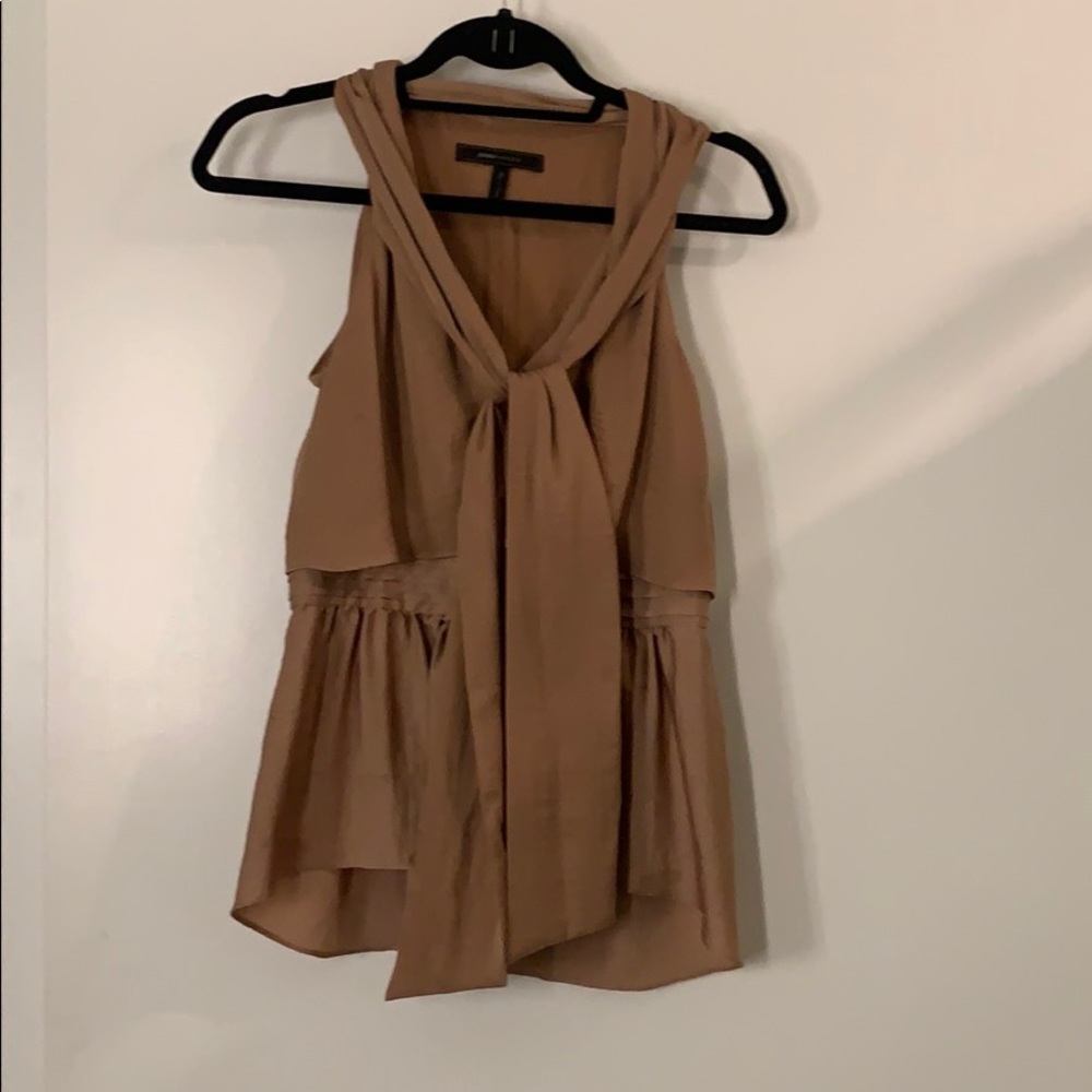 Tan sleeveless blouse